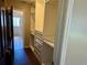 Organized walk-in closet with custom shelving units and easy access to the ensuite bathroom at 7014 Doreen St, Tampa, FL 33617