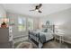 Serene bedroom with natural light, classic furniture, and neutral tones, perfect for relaxation at 764 W Bayshore Dr, Tarpon Springs, FL 34689