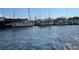 Scenic waterfront view featuring boats docked along the coastline, perfect for nautical enthusiasts at 764 W Bayshore Dr, Tarpon Springs, FL 34689