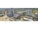 High-angle aerial view of the cityscape, showcasing the river, high-rise buildings, and urban landscape at 777 N Ashley Dr # 3009, Tampa, FL 33602