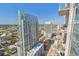 Stunning balcony view showcasing high-rise buildings, a rooftop pool, and the expansive cityscape at 777 N Ashley Dr # 3009, Tampa, FL 33602