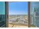 Balcony view of city skyline from a condo, overlooking cityscape with distant buildings and clear blue sky at 777 N Ashley Dr # 3009, Tampa, FL 33602