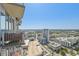 Scenic balcony view, showcasing the city skyline, waterway, and vibrant cityscape from a high-rise condo at 777 N Ashley Dr # 3009, Tampa, FL 33602