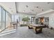 Bright game room with a billiards table and city views, complemented by high ceilings and modern fixtures at 777 N Ashley Dr # 3009, Tampa, FL 33602