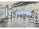 Well-lit gym with varied fitness machines and expansive windows at 777 N Ashley Dr # 3009, Tampa, FL 33602