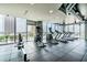 Well-equipped gym with treadmills and city views at 777 N Ashley Dr # 3009, Tampa, FL 33602