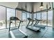 Bright gym with treadmills and large windows at 777 N Ashley Dr # 3009, Tampa, FL 33602