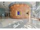 Bright lobby features tiled floors, wood-paneled walls, recessed lighting, and a seating area by large windows at 777 N Ashley Dr # 3009, Tampa, FL 33602