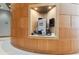Close-up of the lobby featuring a built-in coffee station with a modern machine and essential supplies at 777 N Ashley Dr # 3009, Tampa, FL 33602