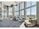 Spacious lounge with comfortable seating, high ceilings, and expansive windows showcasing city views at 777 N Ashley Dr # 3009, Tampa, FL 33602