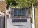 Bird's-eye view featuring the screened-in pool, solar panels, landscaped yard, and outdoor entertaining area at 8508 Canterbury Lake Blvd, Tampa, FL 33619
