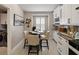 Charming breakfast nook with built-in cabinets and a cozy dining space, perfect for casual meals at 8508 Canterbury Lake Blvd, Tampa, FL 33619