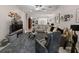 Bright and airy living room with contemporary furnishings and an open layout to the kitchen area at 8508 Canterbury Lake Blvd, Tampa, FL 33619