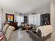 Comfortable living room with modern furnishings, large windows, and neutral decor at 8508 Canterbury Lake Blvd, Tampa, FL 33619