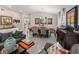 Well decorated living room with a chandelier and view of the dining area at 8508 Canterbury Lake Blvd, Tampa, FL 33619