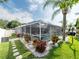 Aerial view of the property highlighting the screened-in pool and meticulously landscaped backyard at 8508 Canterbury Lake Blvd, Tampa, FL 33619