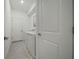 Convenient laundry room featuring a washer and dryer, with tile flooring and ample space at 8589 Saint Kitts Cir, Englewood, FL 34224