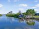 A private boat dock with a boat lift, showcasing easy waterfront access at 925 Eagle Ln, Apollo Beach, FL 33572