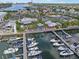 High angle aerial shot of a marina and waterfront restaurant surrounded by docked boats at 925 Eagle Ln, Apollo Beach, FL 33572