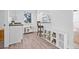 Bright kitchen with a breakfast bar, white cabinets, and modern style at 10819 Seminole N Dr, St Petersburg, FL 33708