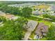Overhead view of the house, its surroundings, and the layout of the neighborhood at 1129 Emerald Hill Way, Valrico, FL 33594