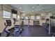 Community fitness center featuring exercise equipment, free weights and ample space for a full workout at 1129 Emerald Hill Way, Valrico, FL 33594