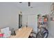 Bright office with desk, bookcase, and closet with easy access to other parts of the home at 1129 Emerald Hill Way, Valrico, FL 33594