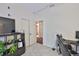 The modern office space includes closet, shelving, light and desk space at 1129 Emerald Hill Way, Valrico, FL 33594