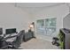Office space featuring a desk, comfortable chair, natural light, and ample room for productivity at 1129 Emerald Hill Way, Valrico, FL 33594