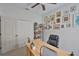 Office with large closet space features a ceiling fan, natural light, a desk, shelving, and ample space at 1129 Emerald Hill Way, Valrico, FL 33594