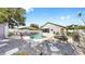 Backyard pool, patio, shed and lounge area on this property at 11302 Crane Lake Ct, Riverview, FL 33569