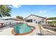Backyard with pool, patio, lounge chairs and well manicured yard at 11302 Crane Lake Ct, Riverview, FL 33569