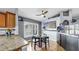 Pleasant breakfast nook with shuttered windows, modern decor, and unique aquarium feature at 11302 Crane Lake Ct, Riverview, FL 33569