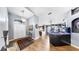 Spacious entryway with a view into the kitchen and a unique aquarium feature at 11302 Crane Lake Ct, Riverview, FL 33569