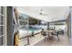 Relaxing lanai featuring a dining set and view of the inviting pool area, creating a perfect outdoor retreat at 11302 Crane Lake Ct, Riverview, FL 33569