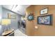 Laundry room with washer, dryer, decorations, and shelving at 11302 Crane Lake Ct, Riverview, FL 33569