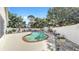 Backyard featuring a beautiful inground pool and landscaped patio area at 11302 Crane Lake Ct, Riverview, FL 33569