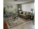 Inviting living room with a neutral color palette, comfortable seating, and elegant decor at 12415 Stagecoach Ln, Hudson, FL 34667