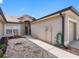 Close up of home's entry with well manicured landscaping and walkway, shows home's side entry garage at 13313 Ashbark Ct, Riverview, FL 33579