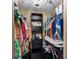 A walk-in closet showcasing organization with clothing racks, shelves, and shoe storage at 13313 Ashbark Ct, Riverview, FL 33579