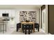 Stylish dining area with natural light, decorative art, and access to the kitchen at 15033 Zircon Red Dr, Wimauma, FL 33598