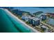 Gorgeous aerial view of a beachside community with condos and marina at 1600 Gulf Blvd # 514, Clearwater Beach, FL 33767