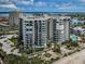 Beautiful high-rise condominium complex with beach access, pool, and lush landscaping at 1600 Gulf Blvd # 514, Clearwater Beach, FL 33767
