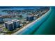 Beautiful aerial view of a beachside community, condos, beaches, and marina at 1600 Gulf Blvd # 514, Clearwater Beach, FL 33767