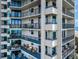 Spacious balconies with seating areas and ocean views in a modern beachfront condo building at 1600 Gulf Blvd # 514, Clearwater Beach, FL 33767