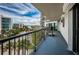 Balcony view showcasing the cityscape, waterfront views, palm trees, and a metal railing at 1600 Gulf Blvd # 514, Clearwater Beach, FL 33767
