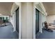 Balcony features a corner view with outdoor seating and sliding glass doors at 1600 Gulf Blvd # 514, Clearwater Beach, FL 33767