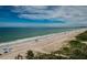 Beautiful beach view of the ocean and sand on a sunny day, showcasing the coastline and horizon at 1600 Gulf Blvd # 514, Clearwater Beach, FL 33767
