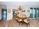 Dining room with natural light and views of the ocean and access to the balcony at 1600 Gulf Blvd # 514, Clearwater Beach, FL 33767