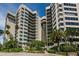 Upscale condo building featuring expansive balconies, well-maintained grounds, and secure entrance at 1600 Gulf Blvd # 514, Clearwater Beach, FL 33767